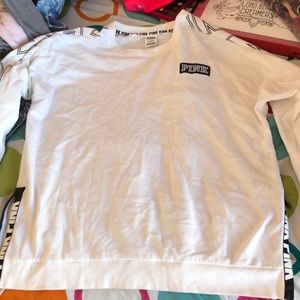 Oversized white shirt with black zippers on side